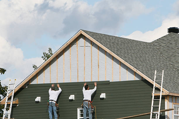 Professional Siding Replacement technician working in Rushsylvania, OH